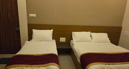 Hotel Sri Murari Room Type - Triple Bed Family room (2 Beds - Queen and Single Bed) Hotel Sri Murari Room Type - Triple Bed Family room (2 Beds - Queen and Single Bed)