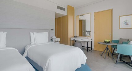Movenpick Resort Al Marjan Island Room Type - Premium Beach and Pool Twin Room Movenpick Resort Al Marjan Island Room Type - Premium Beach and Pool Twin Room