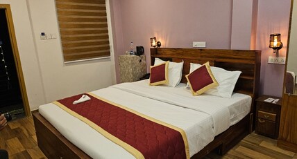 ASR Holidays ,Valparai Room Type - Budget Luxury Family Room with city View-203