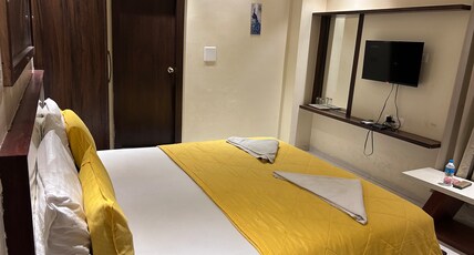 Hotel V Grand Inn Kavali Room Type - Double Deluxe Room With Air Conditioning
