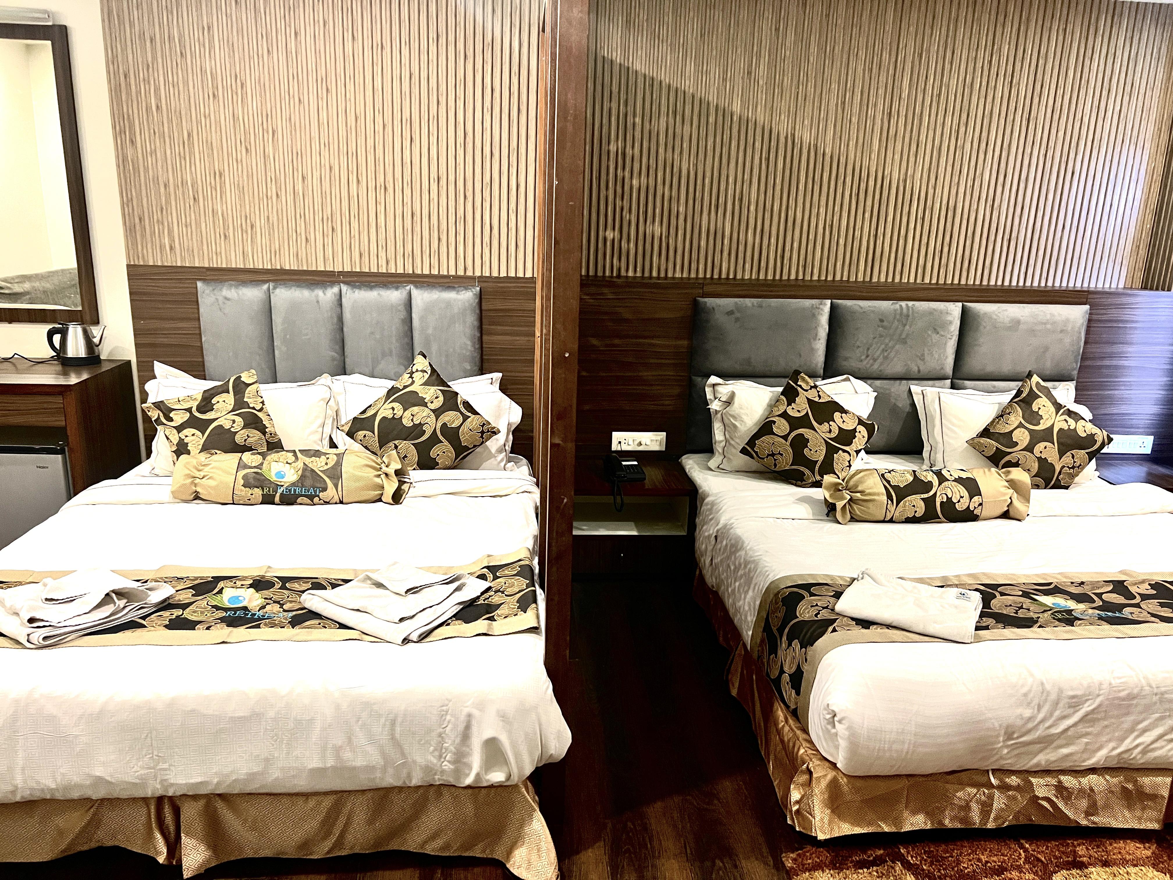 PEARL RETREAT (A Pure Veg Hotel) - Tap to explore photos