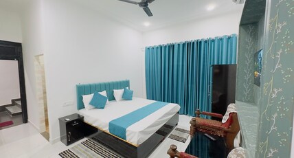Kashika Homestays Room Type - Deluxe  AC Bedroom with balcony