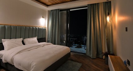 Moksham Stays Room Type - Room with private balcony