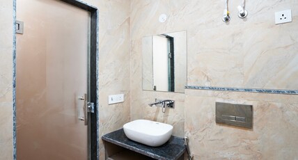 Hotel O Noida Sky Suites Sector 44 Near botanical metro Room Type - Classic