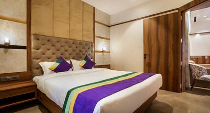 Treebo Premium Savera Inn Room Type - Deluxe Room