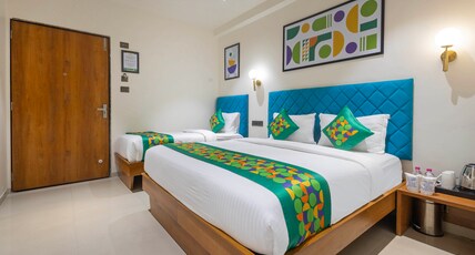 Treebo Executive Suites Room Type - Deluxe Family Room
