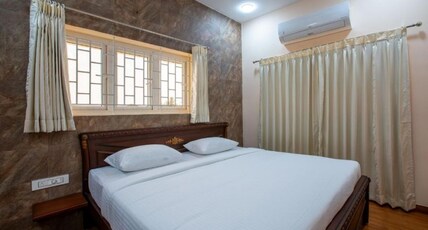 MUGUNDANS  SMART STAY Room Type - Luxury Family Suite