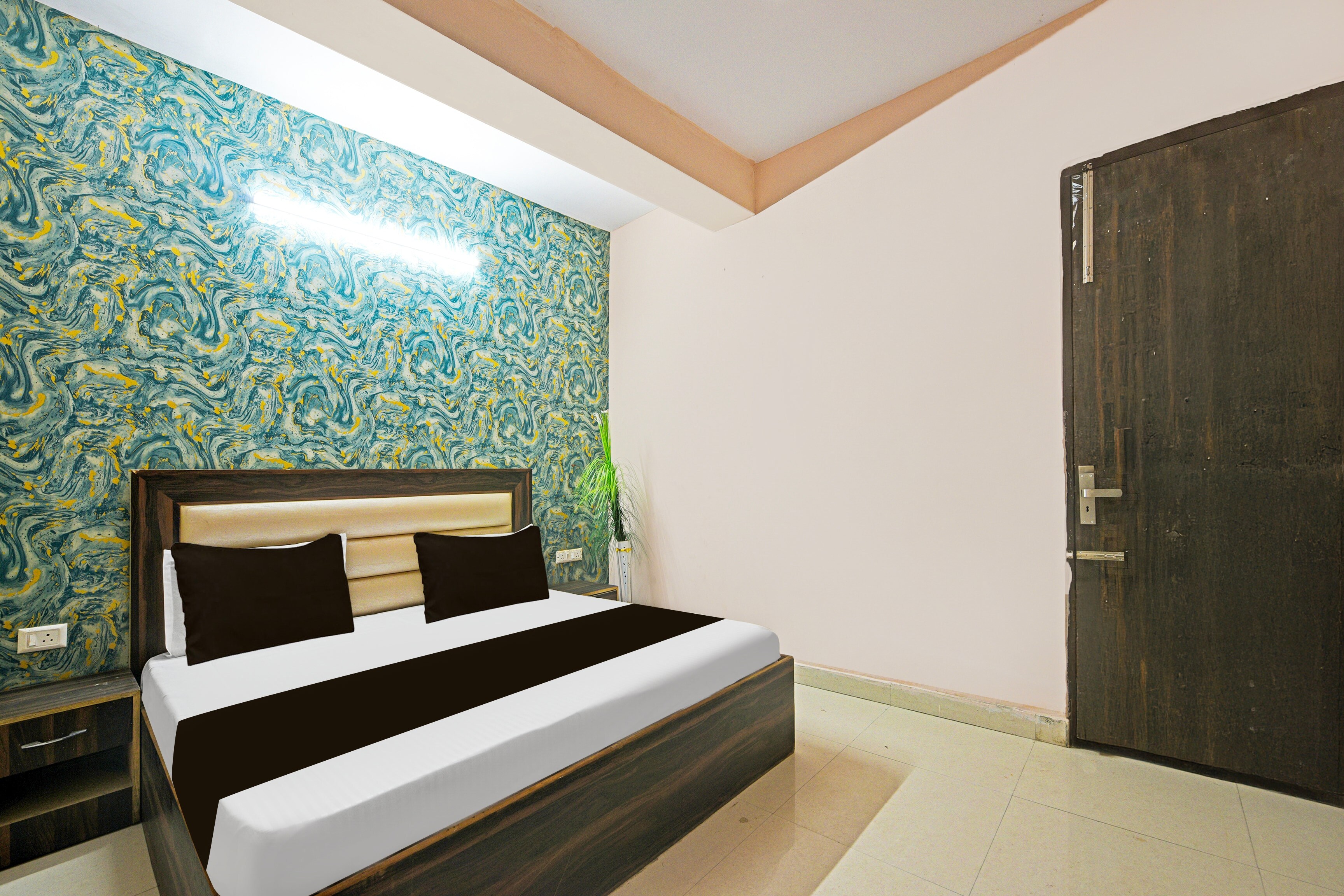 Hotel O Gulabi Delight - Tap to explore photos
