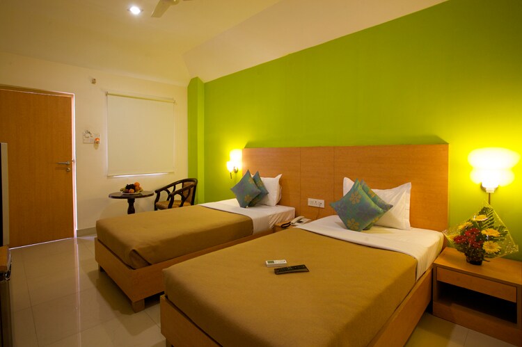 S K FIRST TRANSIT HOTEL - Tap to explore photos