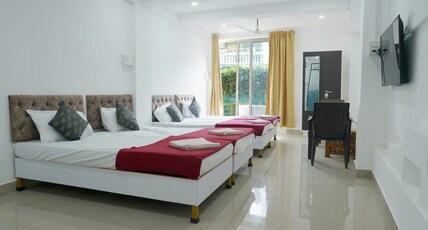 Bliss Holiday Inn Room Type - AC Room with 4 Single Beds
