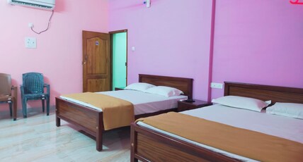 Nesam Residency Room Type - Deluxe Family Room AC