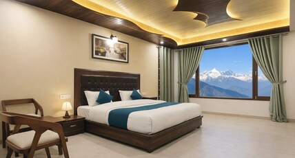 CloudBorn Rooftop Lounge & Stay Room Type - Luxury Room with Mountain View