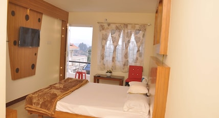 DrizzleDrop Inn Room Type - Deluxe Family Room DrizzleDrop Inn Room Type - Deluxe Family Room