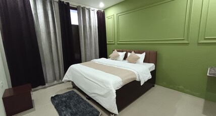 Rajvin Heavens Room Type - Deluxe Room