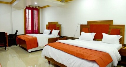 Hotel chembiyan Room Type - Deluxe Room