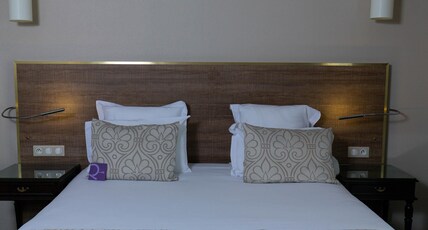 Mercure Cayenne Royal Amazonia Hotel Room Type - Two-room suite-1 double bed and a sofa