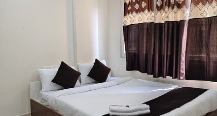 Dhanish Comforts Room Type - Deluxe Room