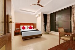 Capital O Elegant Amethyst Business Hotel Near Ragigudda Sri Prasanna Anjaneyaswamy Temple