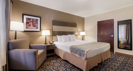 Best Western Butch Cassidy Inn Room Type - 1 King Bed, Non-Smoking, Wireless High-Speed Internet, Coffee Maker, Hairdryer, Iron And Ironing Boa Best Western Butch Cassidy Inn Room Type - 1 King Bed, Non-Smoking, Wireless High-Speed Internet, Coffee Maker, Hairdryer, Iron And Ironing Boa