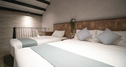Hotel Calmo Hamilton Room Type - Executive Triple Room