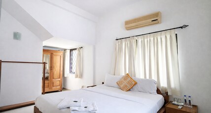 Pixy Homestay Room Type - Deluxe Room with shared bathroom