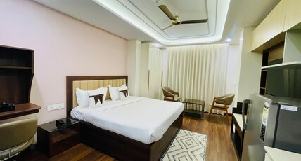 QuickIn Stayz by Rupali Homes Room Type - Deluxe Room with Kitchenette and Balcony