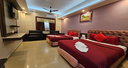 Hotel Landmark Puri, Near to Sea Beach Room Type - AC Deluxe Family Room with Sofa (Four Beds - Two King Size) Hotel Landmark Puri, Near to Sea Beach Room Type - AC Deluxe Family Room with Sofa (Four Beds - Two King Size)