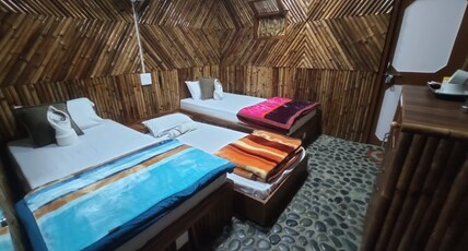 Vedic Vibes Room Type - Furnished Bamboo Hut (Twin Bed)