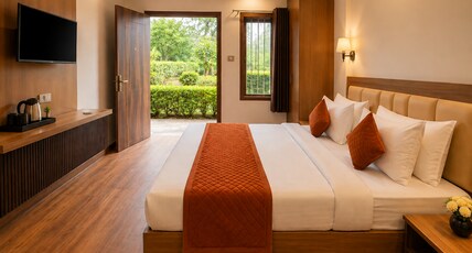 Swastik Resort By Amaratva Room Type - Deluxe Room with Garden View Swastik Resort By Amaratva Room Type - Deluxe Room with Garden View