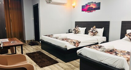 JD Grand Inn (1km away from Paltan Bazaar) Room Type - DELUXE TRIPLE BED