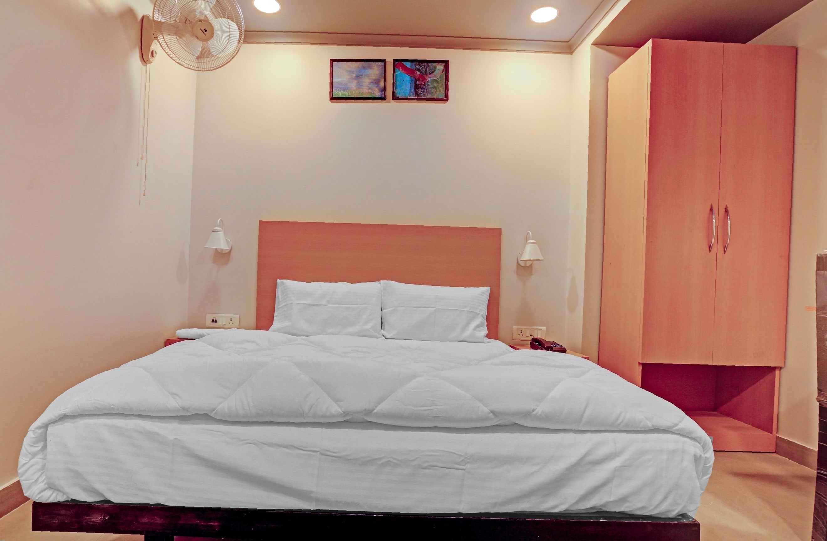 Collection O One Hotel - Tap to explore photos