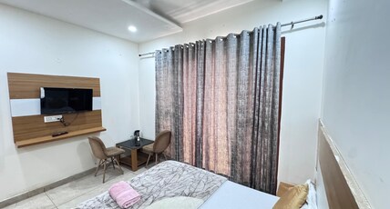 HOTEL U K GREEN VALLEY Room Type - Super Deluxe Room