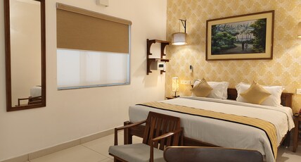 Hotel Aura by Woco Stays Room Type - DELUXE ROOM