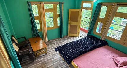 Mountain Goat Guest House & Restaurant Room Type - Top Floor triple side balcony Room