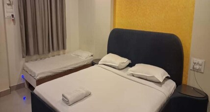 PAVAN MANSION Room Type - Three Bed Non AC Room
