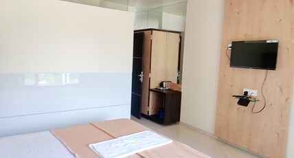 M B Residency Lodging and Boarding Room Type - Deluxe Room A/C