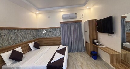 VAINAVI RESIDENCY Room Type - Deluxe Room