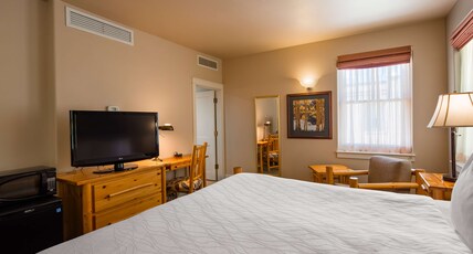 Best Western Plus Plaza Hotel Room Type - Suite-1 King Bed, Non-Smoking, Wi-Fi, Sofabed, Fireplace, Two Televisions, Second Floor, Full Breakf Best Western Plus Plaza Hotel Room Type - Suite-1 King Bed, Non-Smoking, Wi-Fi, Sofabed, Fireplace, Two Televisions, Second Floor, Full Breakf