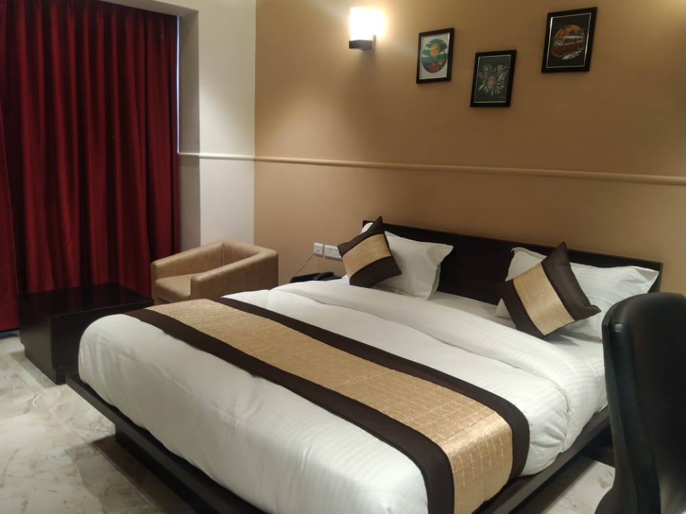 Hotel Maple Inn Ashram Road - Tap to explore photos