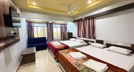 HOTEL SRIKRISHNA INTERNATIONAL Room Type - QUADERAL