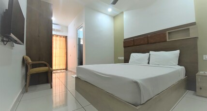 Skanda Residency Room Type - Classy AC Room with Balcony