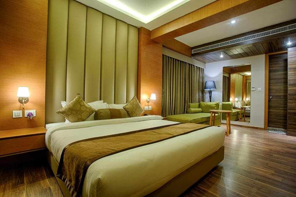 The Four Vedas Hotel and Resort - Tap to explore photos