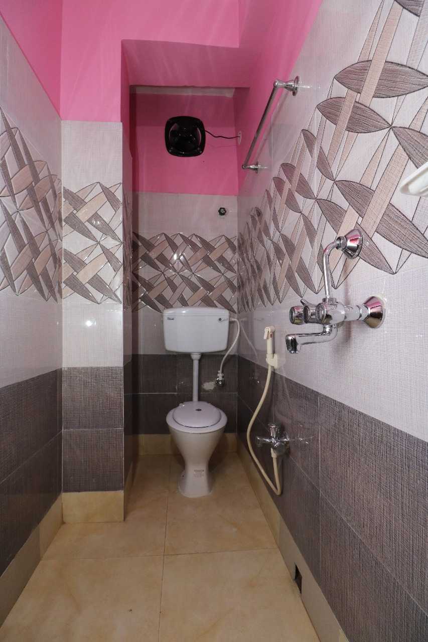 POP Hotel Happy Near Netaji Subhash Chandra Bose International Airport - Tap to explore photos