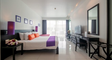 The Old Phuket - Karon Beach Resort Room Type - Deluxe Room with Pool View The Old Phuket - Karon Beach Resort Room Type - Deluxe Room with Pool View