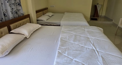 THIRUMALA RESIDENCY Room Type - Family Room Two King Beds