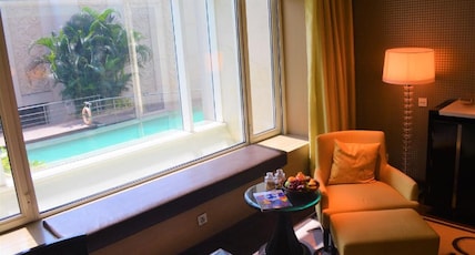 Taj Santacruz, Mumbai Room Type - Luxury Room Pool View King Bed with Bathtub Taj Santacruz, Mumbai Room Type - Luxury Room Pool View King Bed with Bathtub
