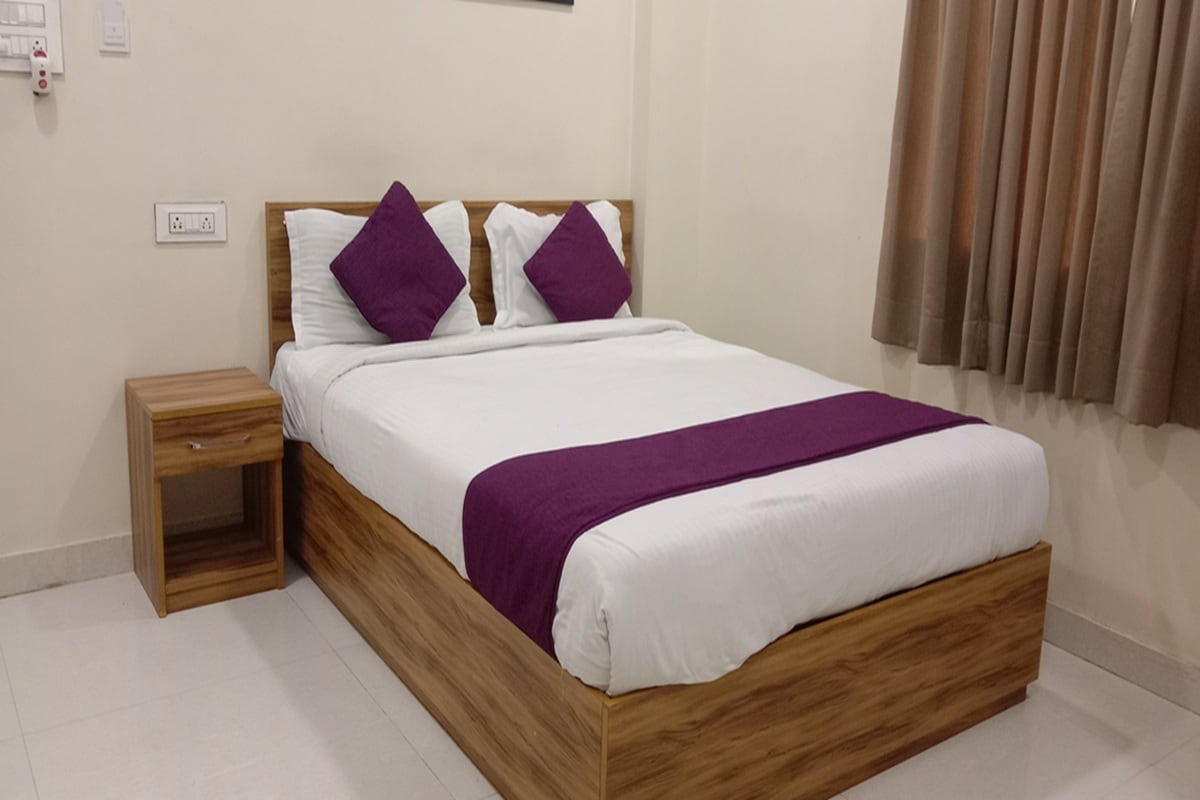 Purple Inn Suites HBR Layout - Tap to explore photos