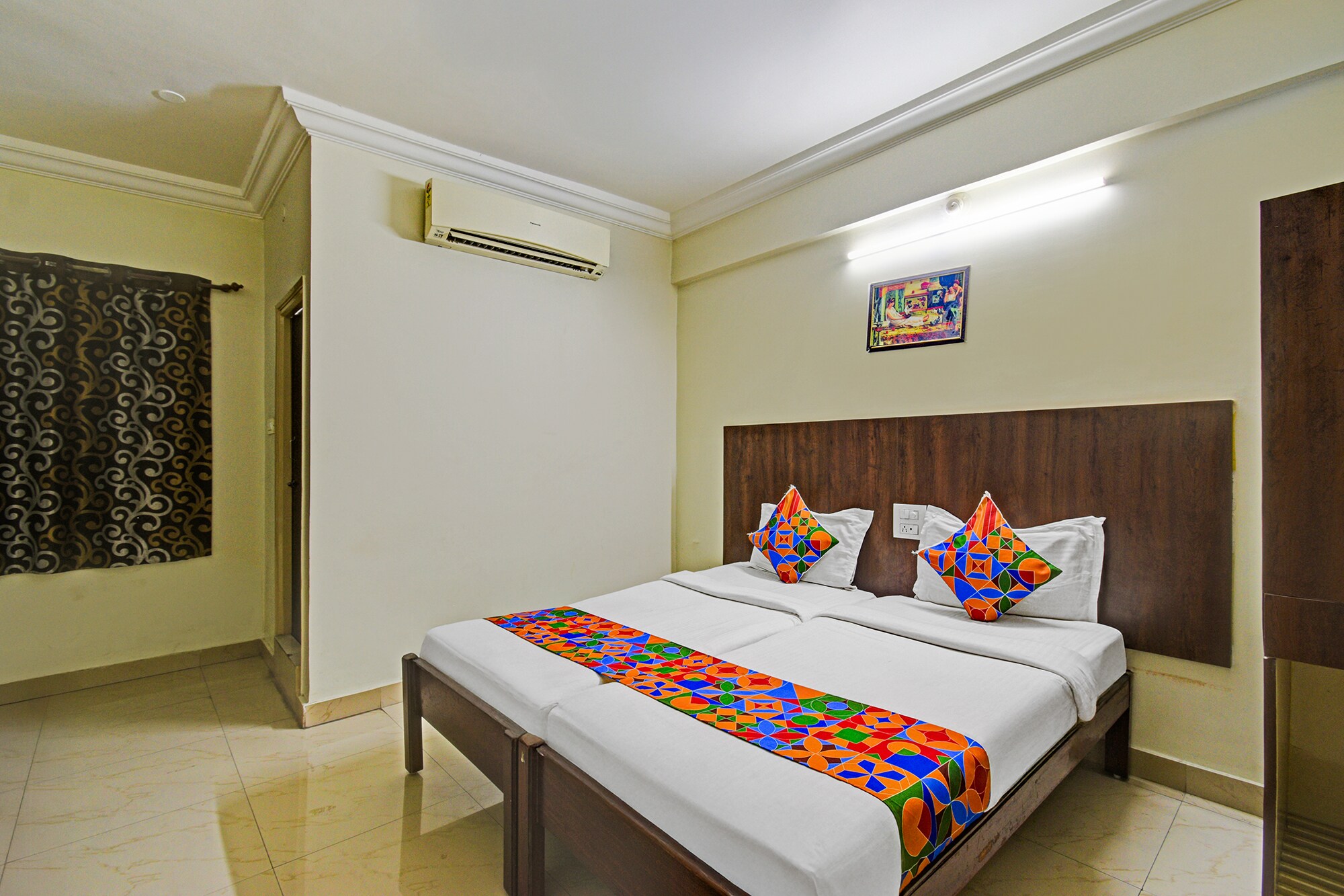 FabHotel Bhavani Inn Luxury Rooms - Tap to explore photos