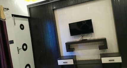 HOTEL ATITHI SATKAAR Room Type - Super Deluxe Room