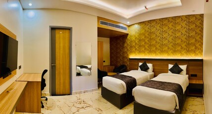The Grand Oasis Hotel and Resort Room Type - Deluxe Twin Room